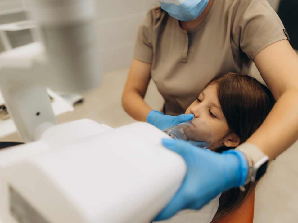 Child undergoing dental sedation